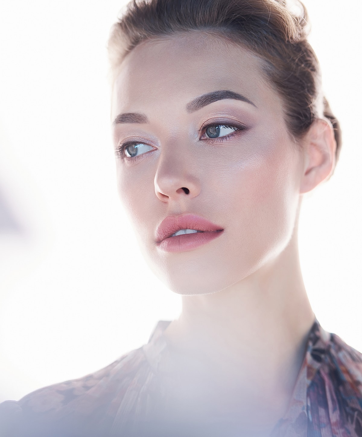 Close-up of a woman with natural makeup.